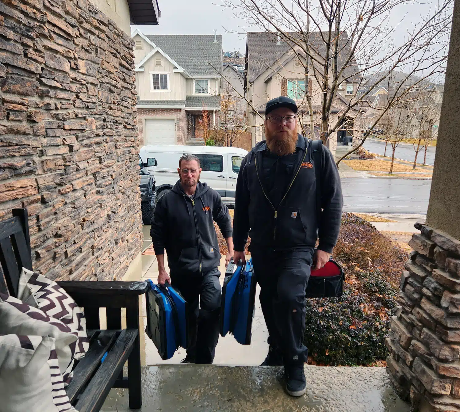 Water damage restoration technicians on site